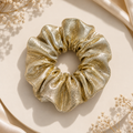 Elegant gold scrunchie with delicate details